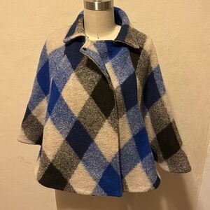 Sharp, navy blue checked cape coat